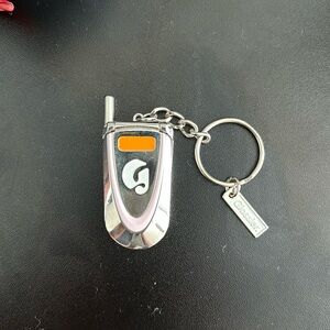 Glossier cell phone key chain mirror